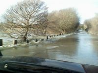 flooded chertsey meads road 2014